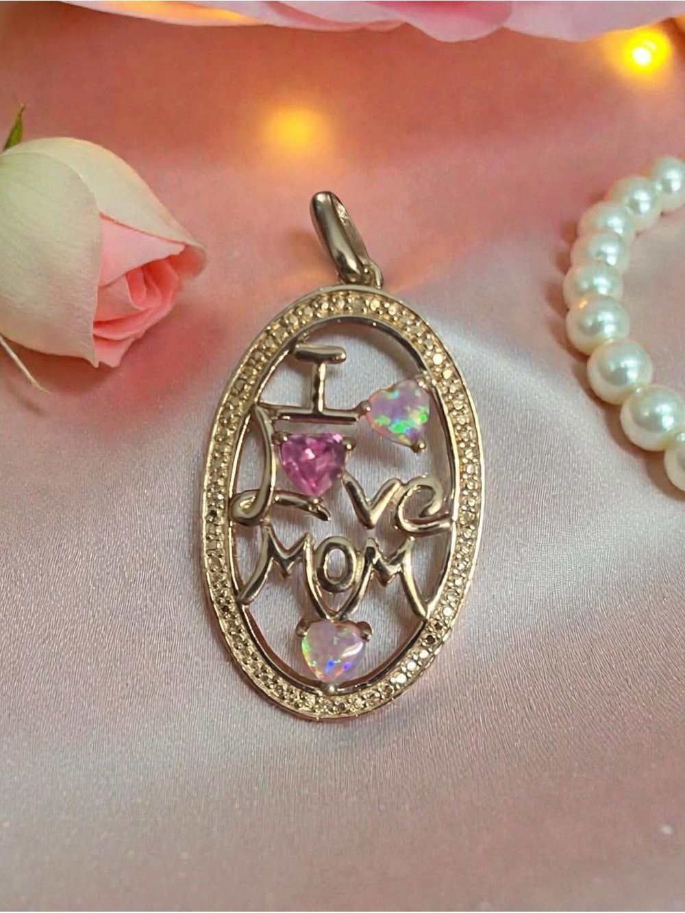 Gorgeous Sterling silver oval Mom pendant with opals and pink sapphire.